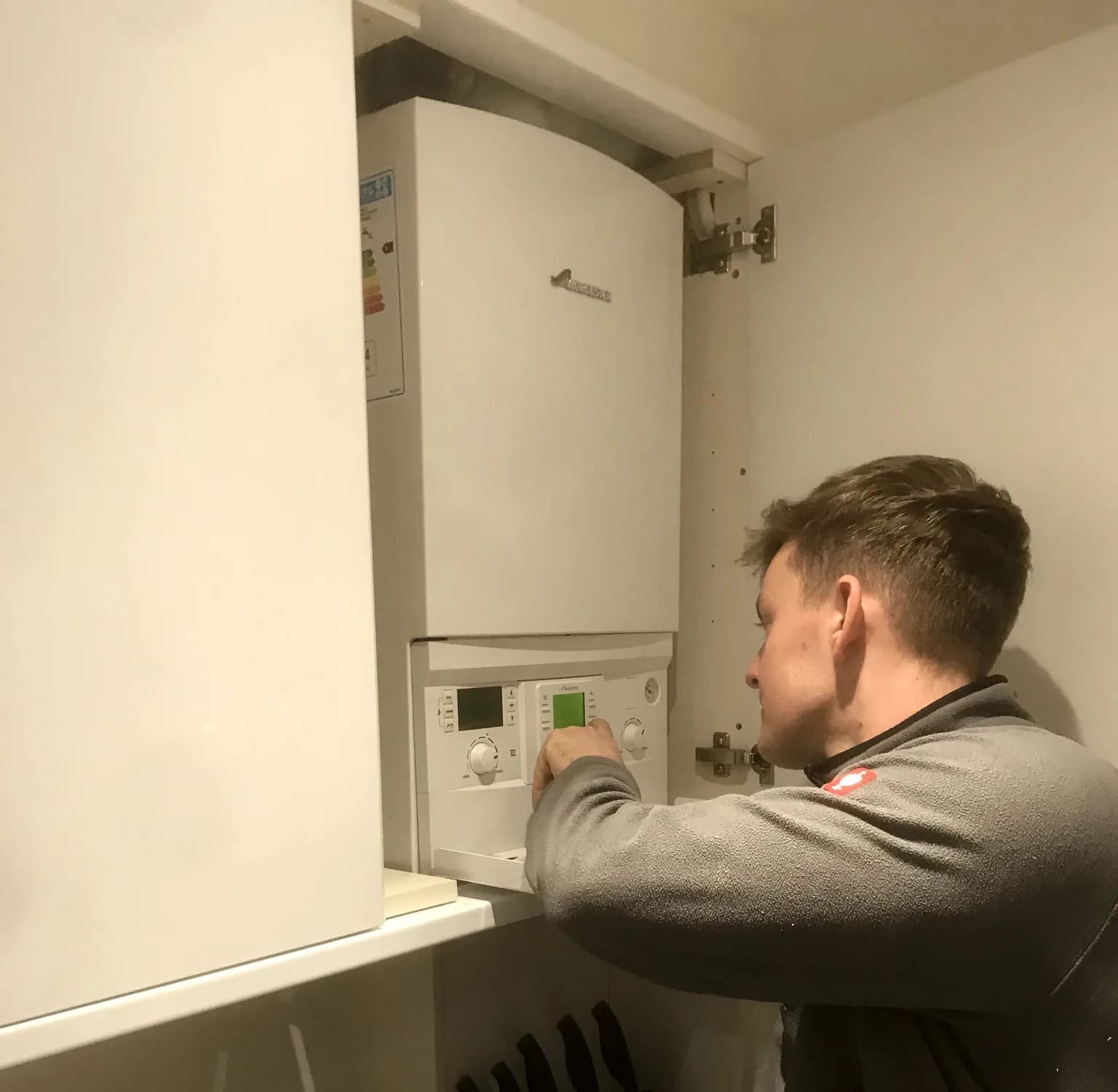 Nichols engineer servicing a Worcester gas boiler in Dorking, Surrey